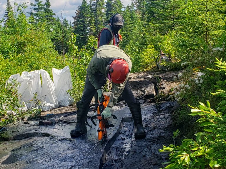 E-Power Resources field crew sampling graphite at the Tetepisca Property, Québec
